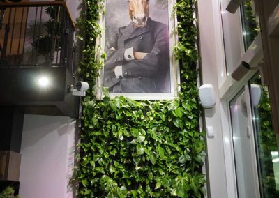 Vertical garden with an incorporated image